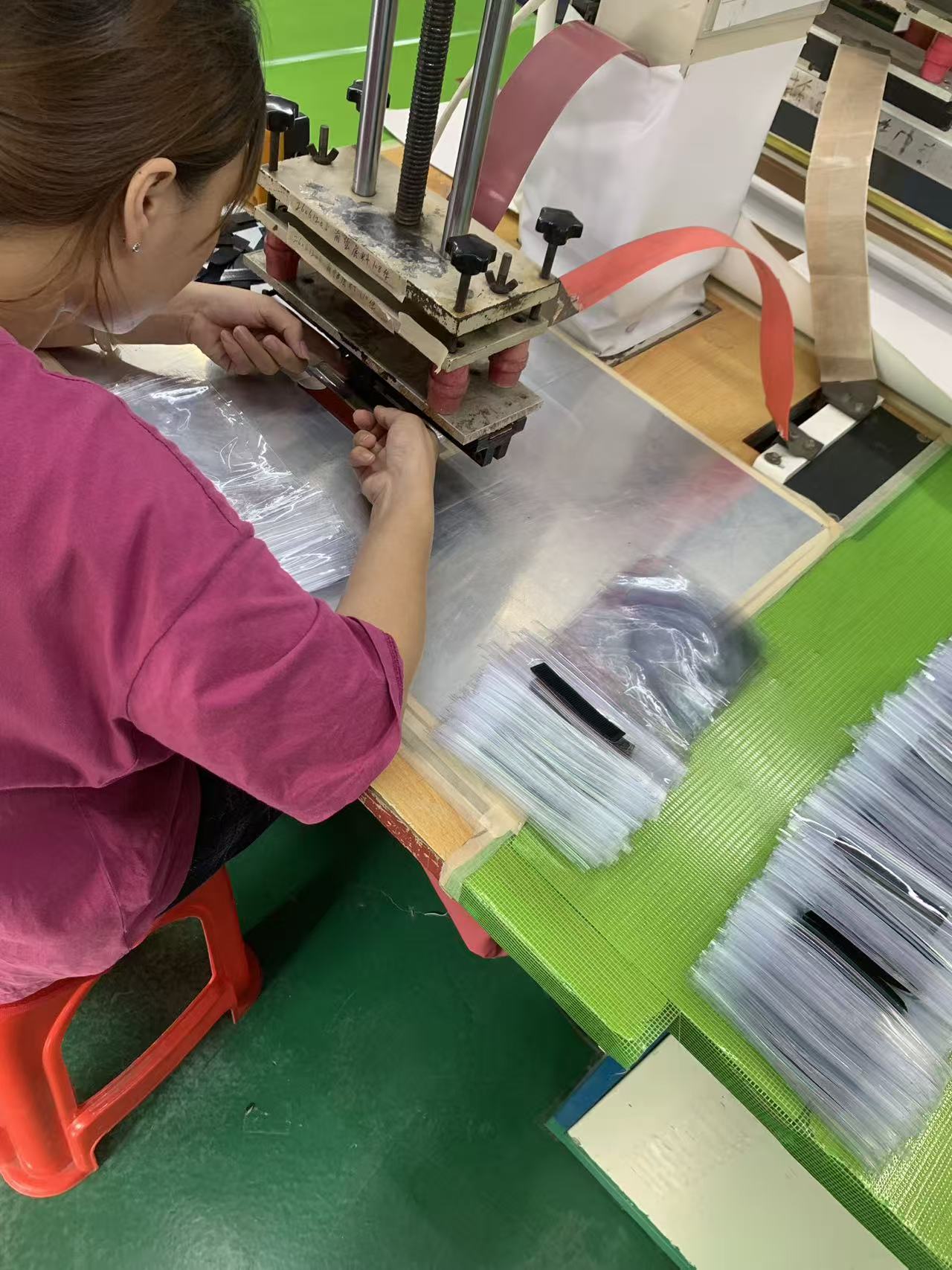 Finished welded clear window components staged in a crate